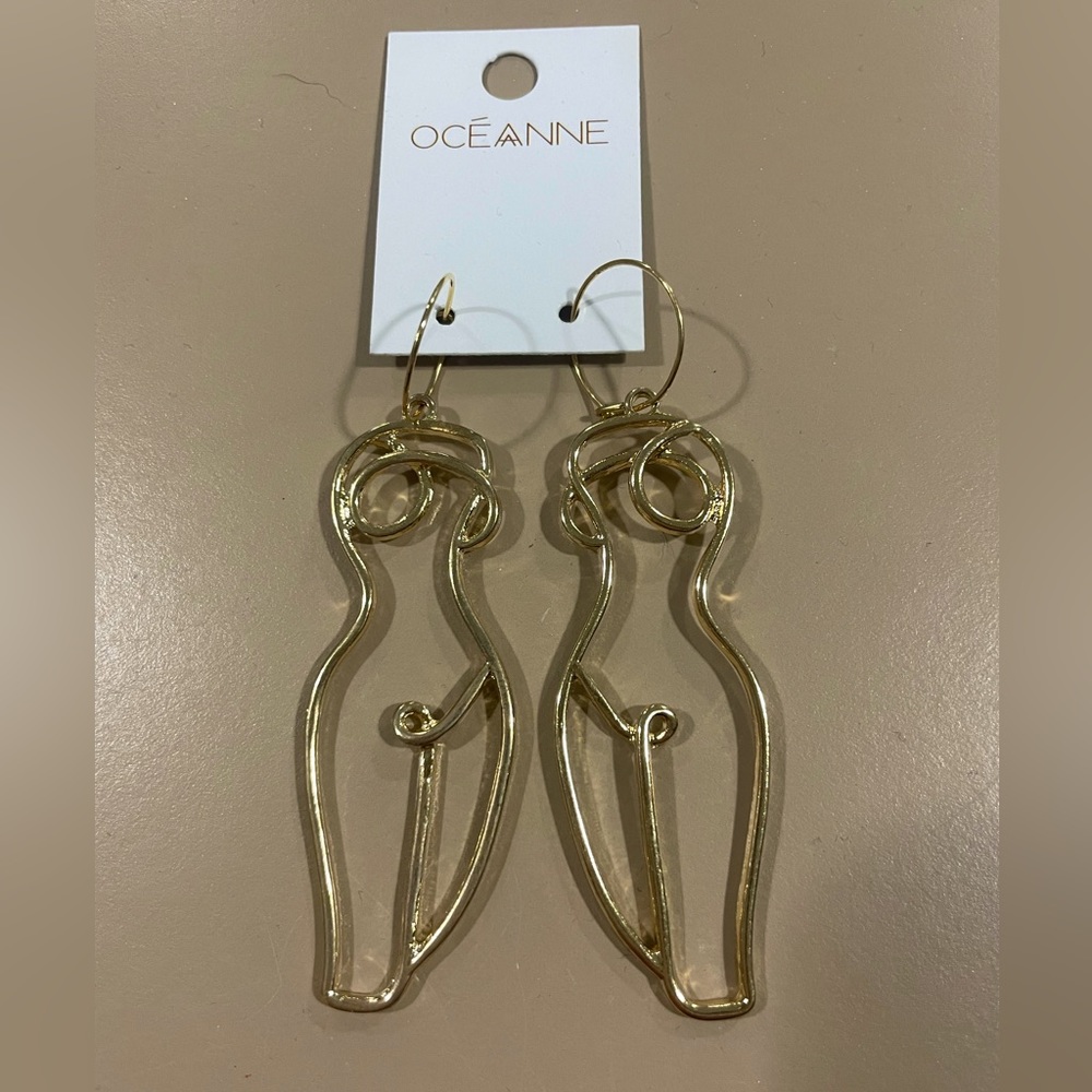 Women’s body gold earrings